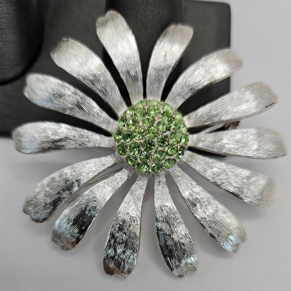 Jewelry - Large Flower Silver tone brooch with green rhinestones.